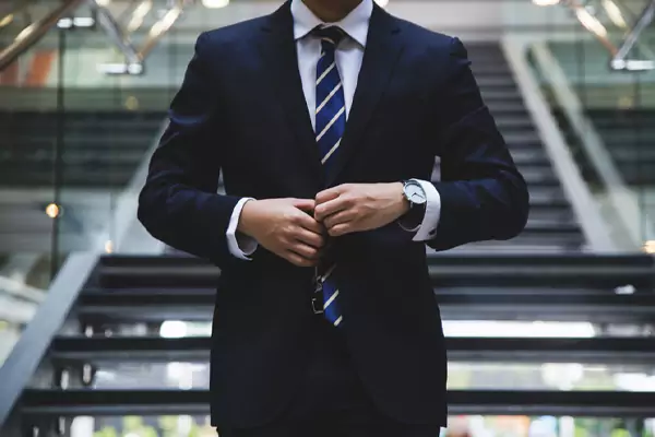 Businessman Wearing a Black Coat